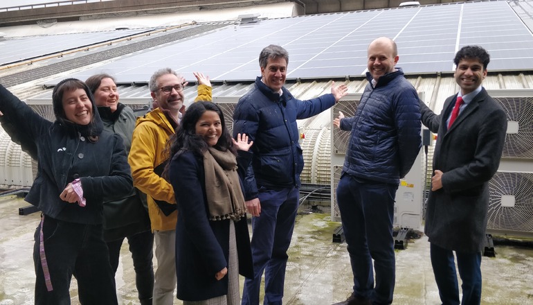 Ed Miliband, and prospective parliamentary candidates Joe Powell and Jude Ryan on North Kensington Community Energy rooftop at Westway Leisure Centre