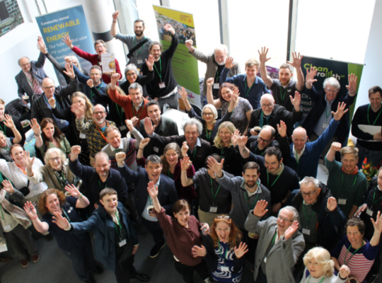 What does it mean to be a member of Community Energy England, and what opportunities does it offer for your staff and volunteers?